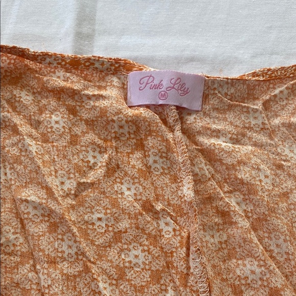 Pink Lily Orange Floral Romper - Picture 2 of 4